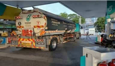 Fuel tanker truck at a petrol station